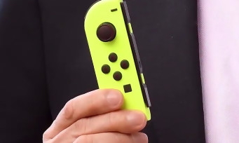 Nintendo Switch : des Joy-Con jaunes néon et une batterie à piles externe